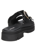 Sandalia de cuero negro para mujer, estilo chunky, con correas anchas ajustables y elementos decorativos metálicos.