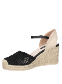 Alpargata negra de estilo boho-chic para mujer, suela de plataforma natural y bordados elegantes, ideal para paseos urbanos.