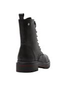Botín de cuero negro, resistente y duradero, adecuado para invierno, eventos casuales, y un estilo con carácter.