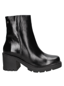 Botín de cuero negro para mujer, versátil para combinar con jeans o faldas midi, ideal para la oficina o salidas casuales.