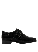 Zapato negro de cuero para mujer, estilo Oxford, combina un diseño clásico con toques contemporáneos.