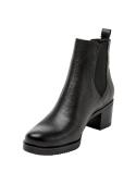 Botín Chelsea de cuero negro para mujer, ideal para el invierno.