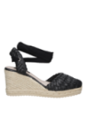 Calzado ligero y cómodo en material PU, ideal para días cálidos de verano.