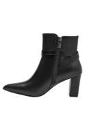 Botín de cuero negro para mujer, diseño minimalista con detalles contemporáneos, perfecto para otoño e invierno.