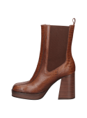 Bota de cuero café para mujer, estilo Chelsea, con paneles elásticos y diseño sofisticado, perfecta para ciudad o eventos.