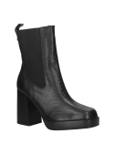 Versátil bota Chelsea negra de cuero para mujer, combina estilo sofisticado y robustez, adecuada para uso diario y elegante.