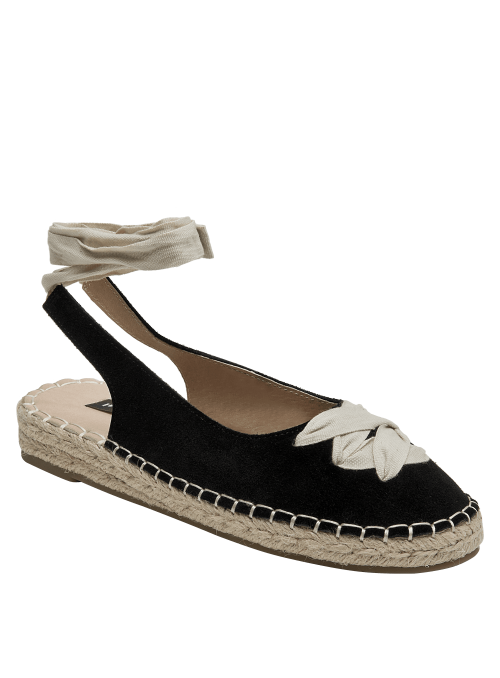 Alpargata casual de cuero negro para mujer, con lazo decorativo y suela de yute.