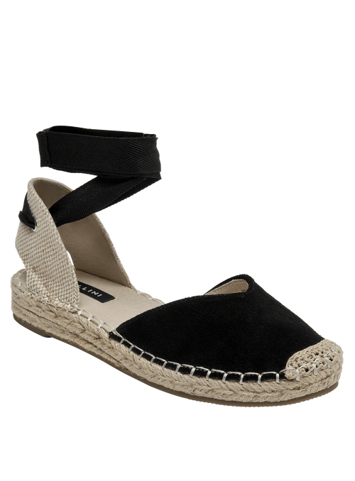 Elegante alpargata de cuero negro con punta cerrada, ideal para primavera-verano.