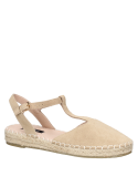 Suela artesanal de esparto en alpargata beige de cuero, combinable con faldas midi.
