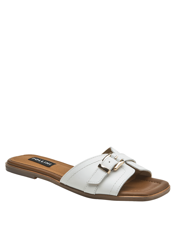 Textura lisa del cuero blanco en sandalia casual de mujer, sensación de limpieza y sofisticación.