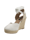 Alpargata de cuero beige para mujer, diseño elegante y contemporáneo con textura granulada.