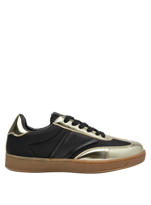 silueta moderna de zapatilla negra con acentos dorados brillantes y suela color caramelo
