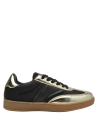 zapatilla negra de mujer con toques dorados, perfecta para estilos casuales y semi-formales