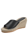 Sandalia casual de cuero negro con suela de esparto estilo boho-chic para un look versátil.