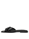 Calzado casual negro de cuero para mujer, con taco plano de 1 cm y capellada limpia.