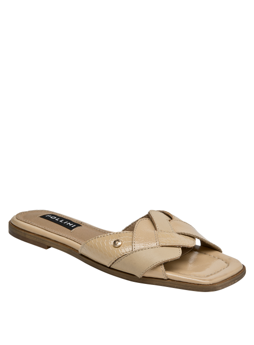 Sandalia de cuero beige con taco de 1 cm, perfecta para combinar con diversos estilos.