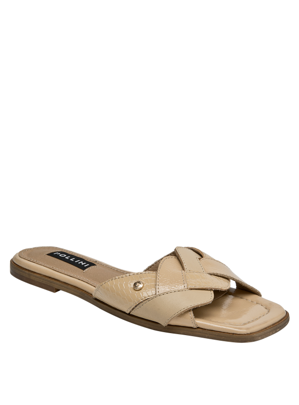 Sandalia de cuero beige con taco de 1 cm, perfecta para combinar con diversos estilos.