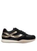 Zapatilla negra de mujer, estilo chic y versátil, confeccionada en cuero para mayor durabilidad.