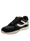 Zapatilla casual negra de cuero para mujer, ideal para actividades diarias y combinaciones elegantes.
