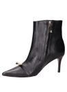 Botín negro de cuero para mujer, estilo vestir, ideal para ocasiones elegantes.