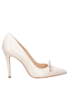 Zapato de cuero beige para mujer, estilo moderno, adecuado para eventos sociales.