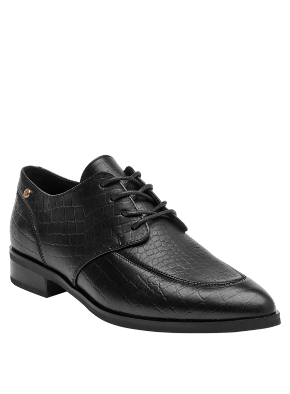 calzado de mujer en cuero negro, diseño elegante para actividades formales y casuales.