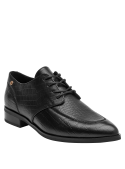 calzado de mujer en cuero negro, diseño elegante para actividades formales y casuales.