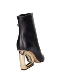Botines de mujer en color negro, estilo vestir, perfectos para un look sofisticado.
