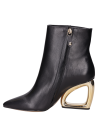 Calzado negro de mujer, botines con taco fantasía, perfecto para eventos formales.