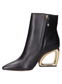 Calzado elegante negro, botines de cuero para mujer, ideal para combinar con vestidos.