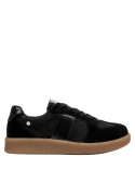 Zapatillas negras de cuero para mujer, estilo casual, aptas para eventos informales y actividades cotidianas.