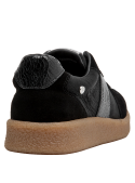 Zapatillas negras de cuero para mujer, diseño elegante, combinables con vestidos o jeans para diversas ocasiones.