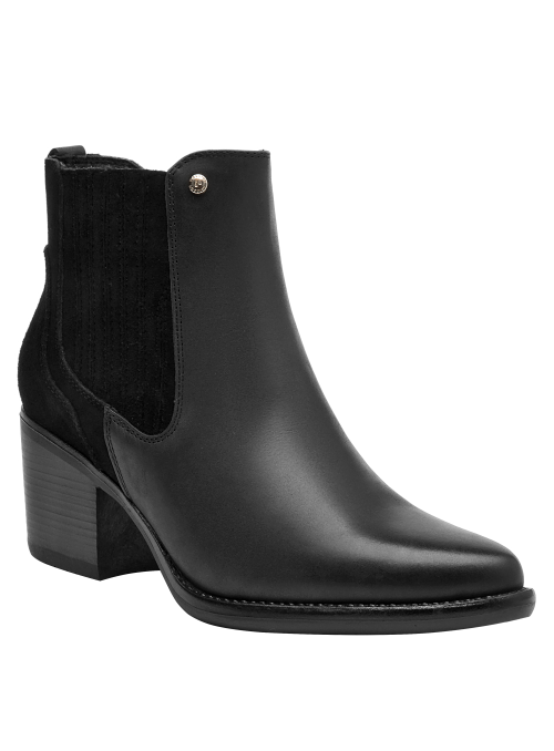 Botín negro de cuero para mujer, punta puntiaguda, recomendado para ocasiones informales y chic.