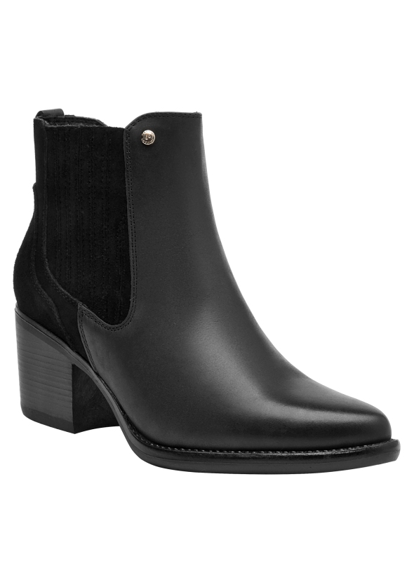 Botín negro de cuero para mujer, punta puntiaguda, recomendado para ocasiones informales y chic.