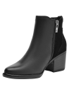 Botín negro de cuero para mujer, estilo casual, ideal para combinar con jeans ajustados.