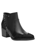 Botín de mujer en negro, cuero liso y texturizado, perfecto para combinar con vestidos.