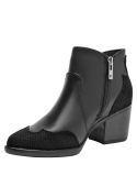 Botín negro de cuero para mujer, estilo casual, ideal para salidas informales.