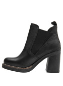 Botín Chelsea negro, diseño elegante y moderno para mujeres que buscan estilo y confort.