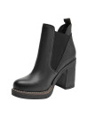 Botín Chelsea negro de cuero para mujer, ideal para ocasiones elegantes y confort diario.