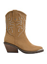 Botín vaquero camel con textura encantadora, diseñado para el empoderamiento femenino.