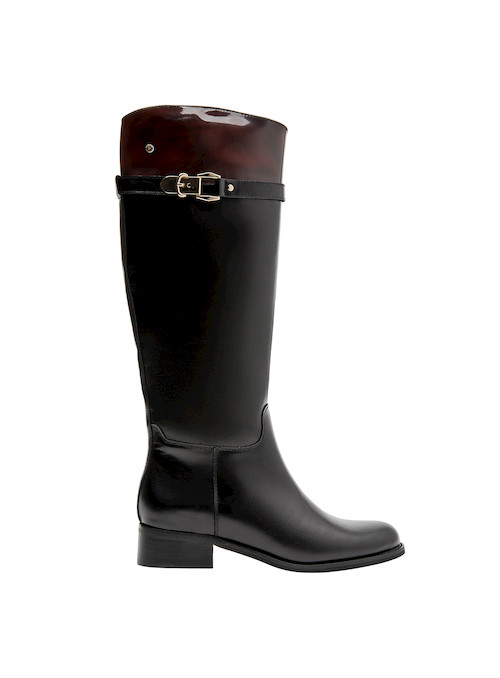 Bota de cuero negro para mujer, taco bloque que aporta estabilidad y estilo en cualquier ocasión.