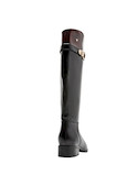 Bota de cuero negro para mujer, acabado lujoso, ideal para un look contemporáneo en la oficina o salidas nocturnas.