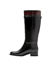 Bota de cuero negro para mujer, diseño de punta redonda, perfecta para combinar con vestidos o jeans.