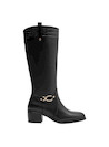 Bota de cuero negro para mujer, taco bloque que ofrece estabilidad y comodidad, ideal para vestidos midi o jeans.