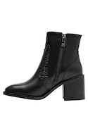 Botín casual negro de cuero para mujer, diseño elegante que combina comodidad y estilo.