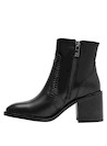 Botín casual negro de cuero para mujer, diseño elegante que combina comodidad y estilo.