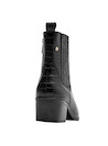 Botín de cuero negro para mujer, que aporta un look actual y atrevido.