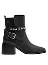 Botín negro de cuero con detalles vanguardistas, perfecto para elevar cualquier atuendo casual.