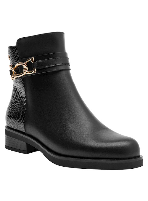 Botín de mujer en cuero negro, acabado sofisticado, ideal para un look vanguardista y urbano.
