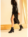 Botín negro de cuero para mujer, estilo casual, con taco bloque y punta cuadrada.